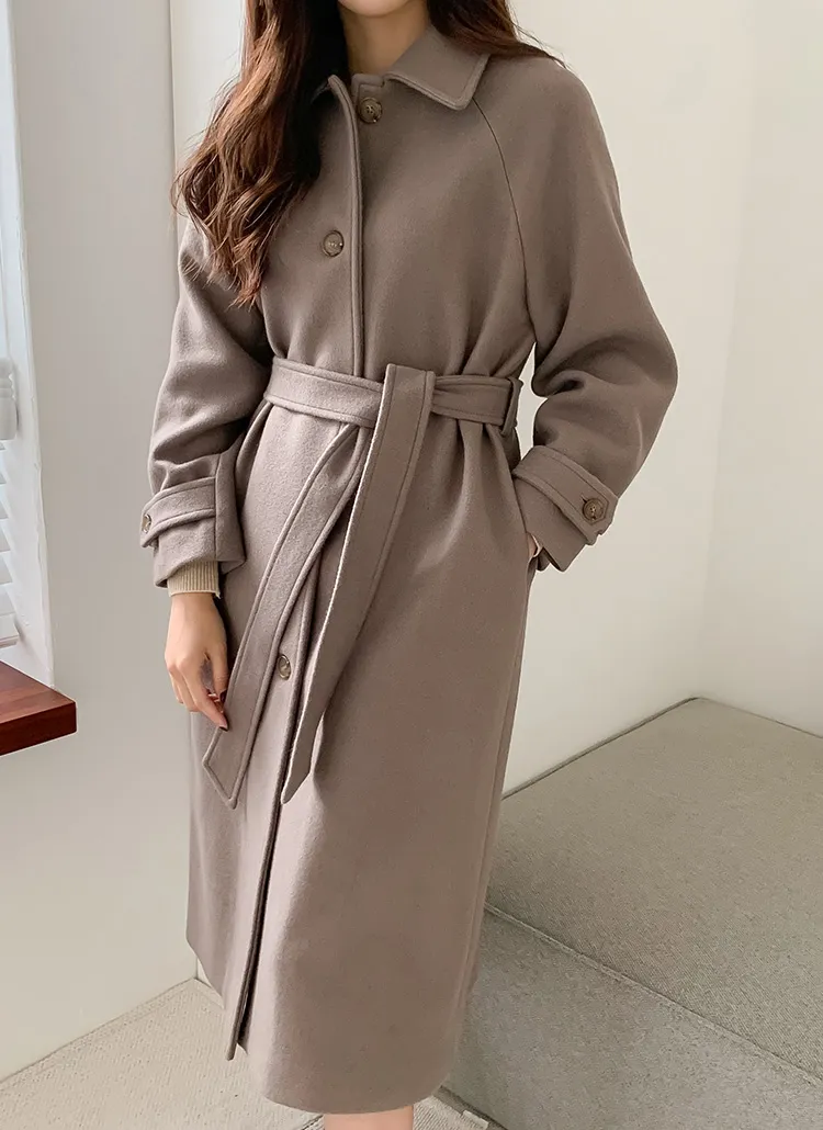 ストラップ付ラグランスリーブロングコート | レディースファッション  