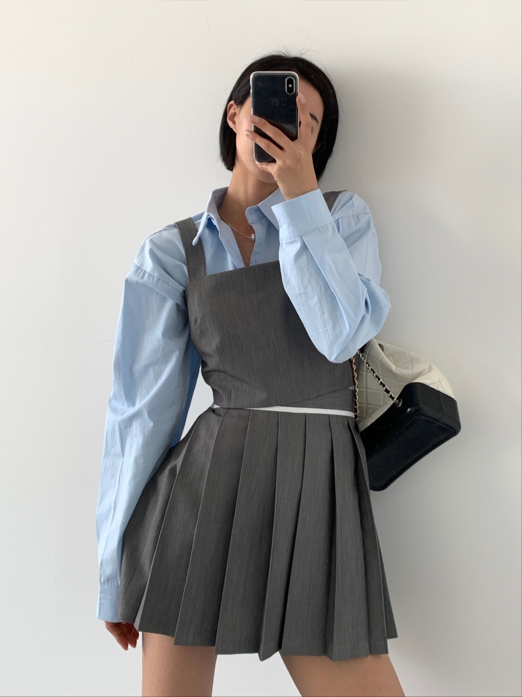 バックボタンビスチェ&配色プリーツミニスカートSET | レディース