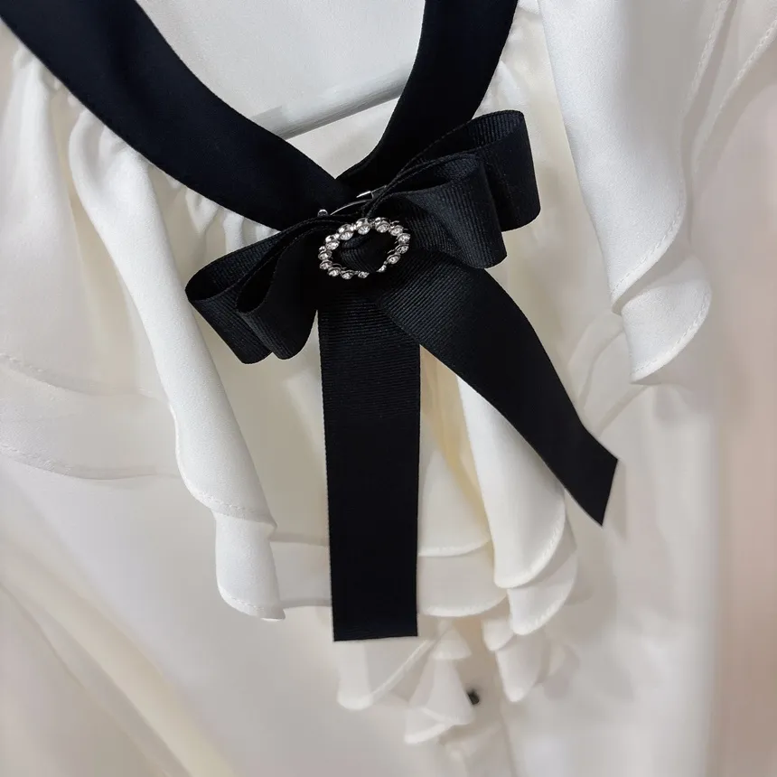 ラッフルボタン長袖配色ブラウスブローチ付 | mirangmirang | 詳細画像19