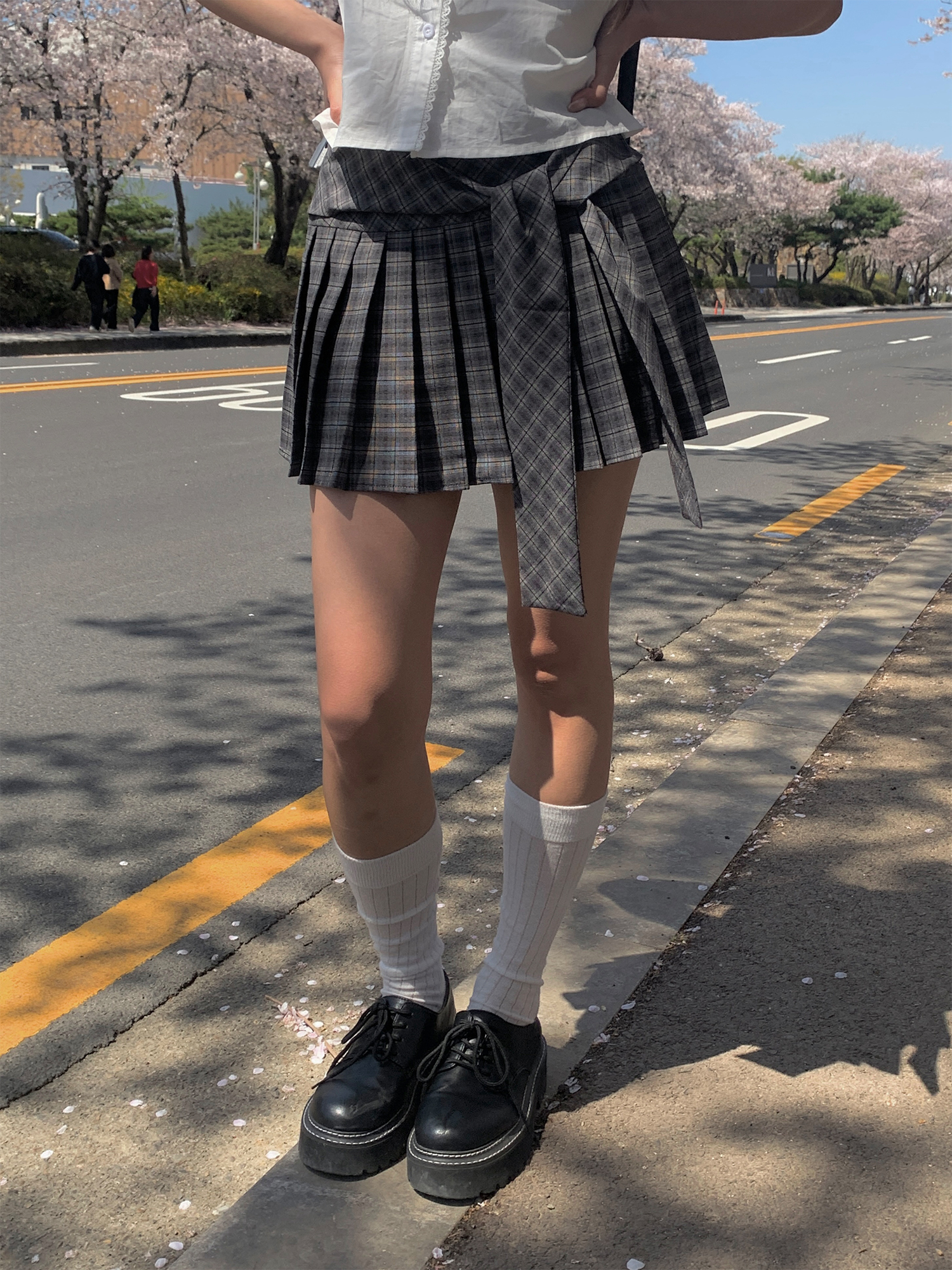 ストラッププリーツサイドジップAラインミニチェックスカート