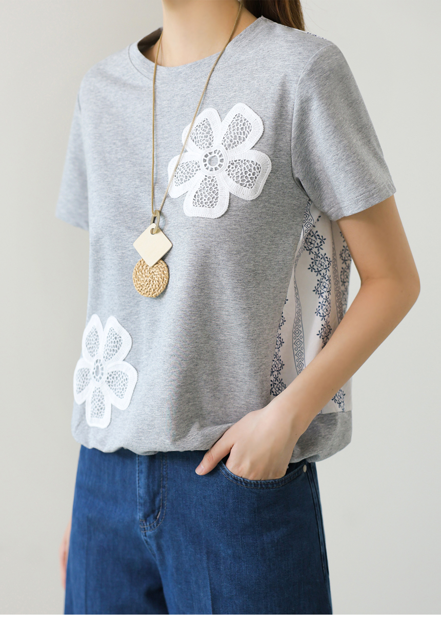 ラウンドネックドローストリング花柄刺繍配色Tシャツ | レディース