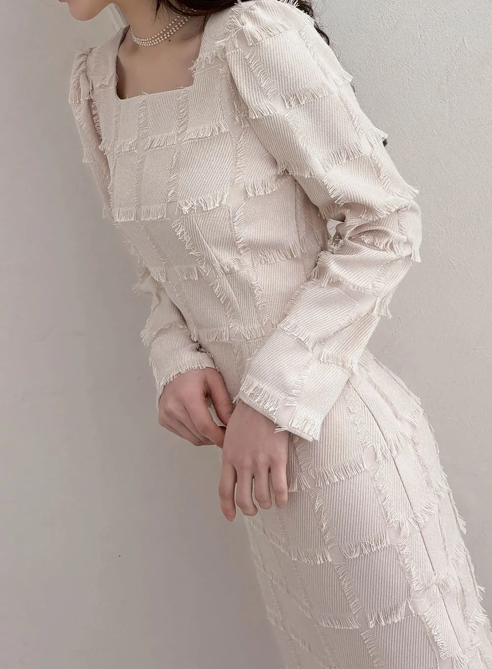 베이지 원단의 잔잔한 수술 텍스처